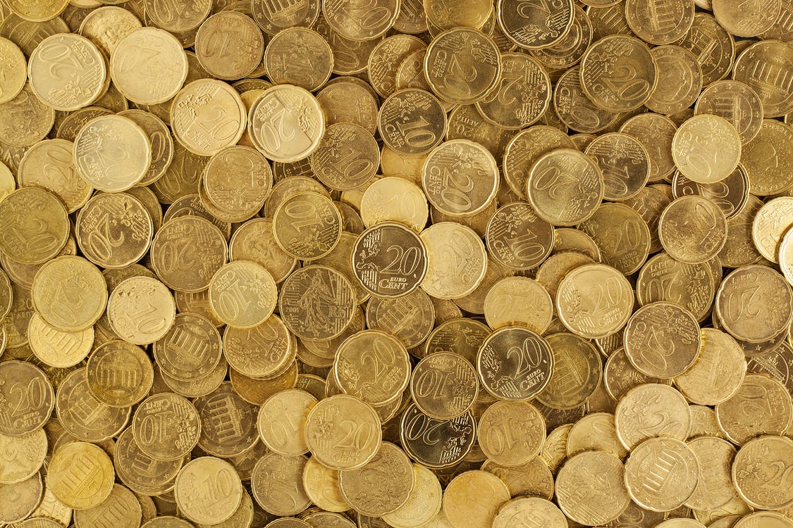Free Pile of Gold Round Coins Stock Photo